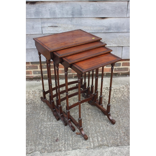 656 - A nest of four mahogany quartetto tables of Regency design, 21