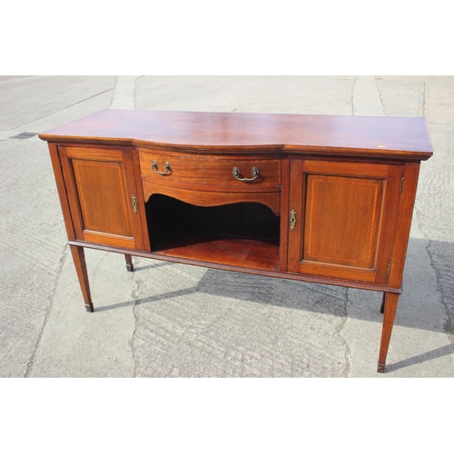 658 - A mahogany and banded break bowfront sideboard, fitted one drawer and two cupboards enclosed panelle... 