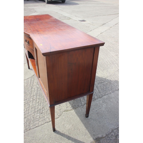 658 - A mahogany and banded break bowfront sideboard, fitted one drawer and two cupboards enclosed panelle... 