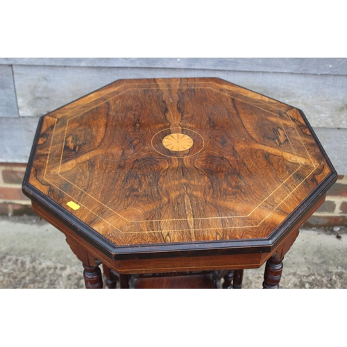 660 - An Edwardian rosewood and inlaid octagonal two-tier occasional table, on turned and castored support... 