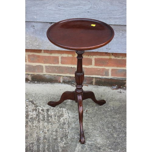 664 - Two mahogany shape top occasional tables with tooled lined tops, on turned column and quadruple spla... 