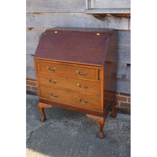 693 - A mahogany fall front bureau with fitted interior over three drawers, on cabriole claw and ball supp... 