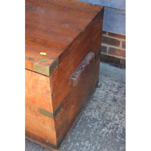 694 - A teak strongbox with brass mounts, 38