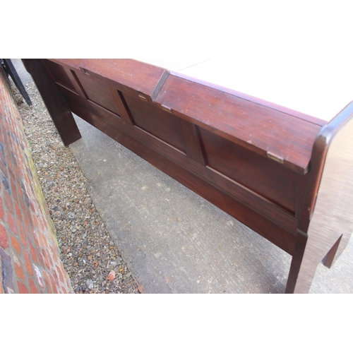 700 - A set of three mahogany four-box seat pews, by C Mellier & Co. 76