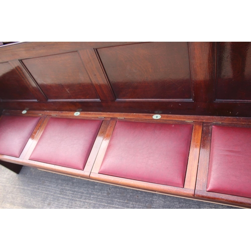 700 - A set of three mahogany four-box seat pews, by C Mellier & Co. 76