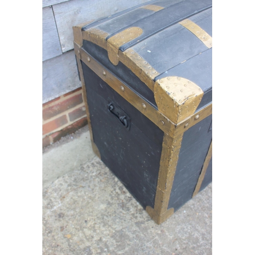 754 - A brass bound dome top trunk with wrought iron carry handles, 30