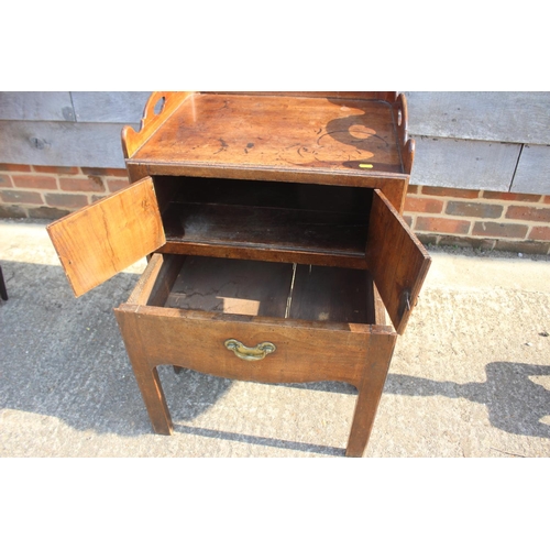 590 - A 19th century mahogany tray top washstand enclosed two doors over pull-out slide, 21 1/2