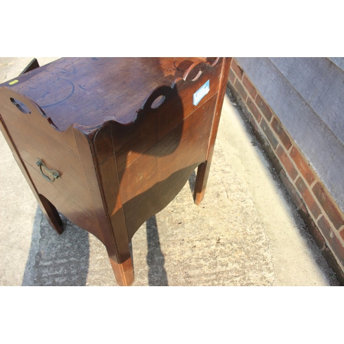 590 - A 19th century mahogany tray top washstand enclosed two doors over pull-out slide, 21 1/2