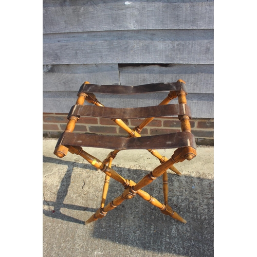 672 - A butler's satin birch spindle galleried tray with brass base, on 'X' frame stand, 30