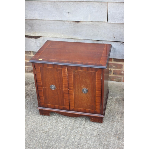 674 - A mahogany and brass mounted bedside chest of drawers, 18