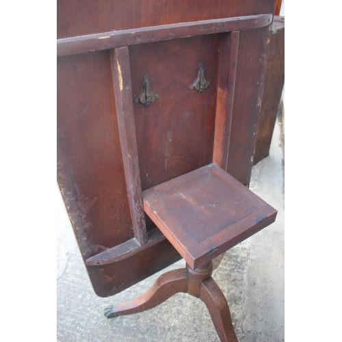 548 - A 19th century mahogany tilt top breakfast table, on turned column and splay support, 29