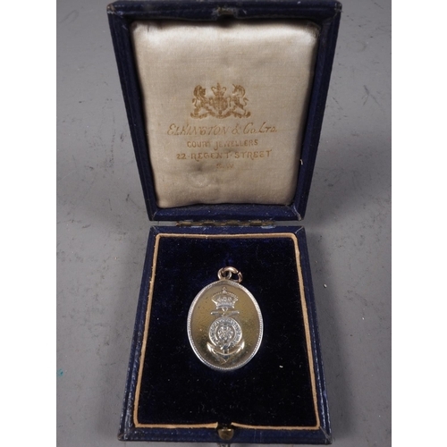 239 - A cased silver HMS Ophir medal, dated 1901, a silver athletics medallion, three Victorian silver coi... 