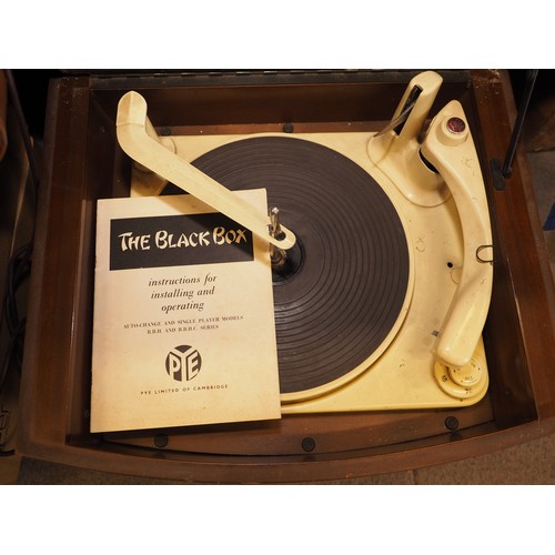 290 - A wooden cased Pye record player and a large quantity of vinyl and 78's