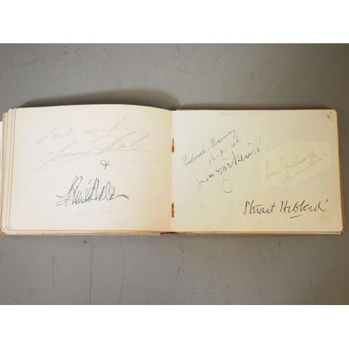 336 - An album containing autographs of stars of stage and screen, including Jon Pertwee, Peter Cavenagh, ... 