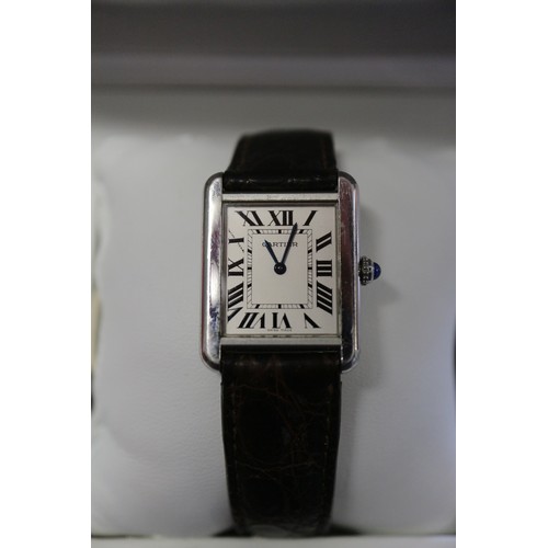 380 - A gentleman's Cartier stainless steel cased Tank wristwatch with quartz movement, silvered dial and ... 