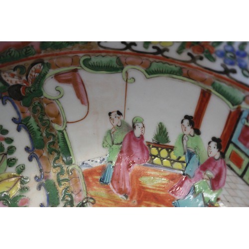 115 - A Canton famille verte enamel bowl with figure decorated panels, 9