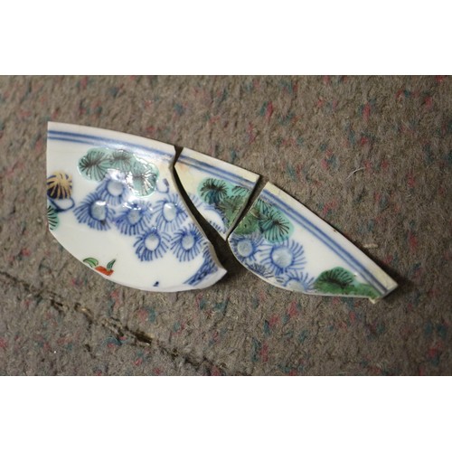 121 - Four Chinese porcelain blue and white plates, decorated various landscapes, 9