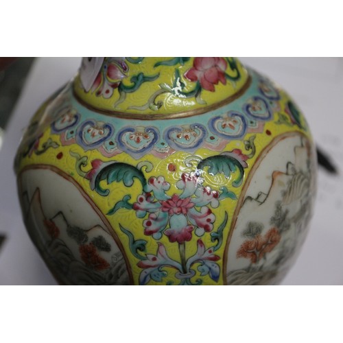 126 - A Chinese 19th century porcelain baluster vase, decorated four landscape panels on a yellow glazed f... 