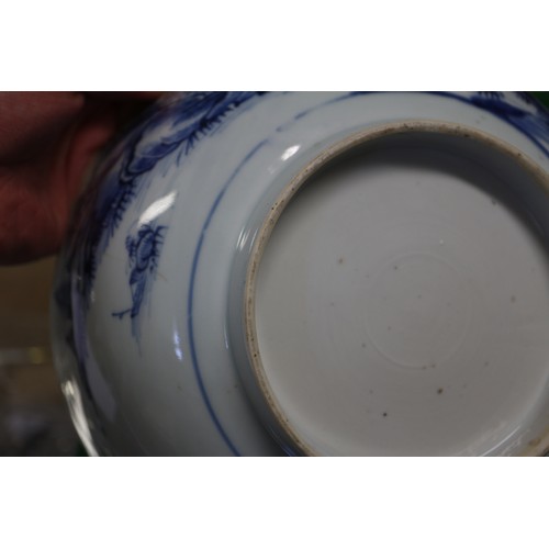143 - A 19th century Chinese porcelain bowl, decorated buildings, 9 1/4
