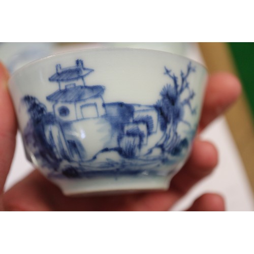 149 - Three Nanking cargo tea bowls and saucers with blue and white landscape decoration, and 