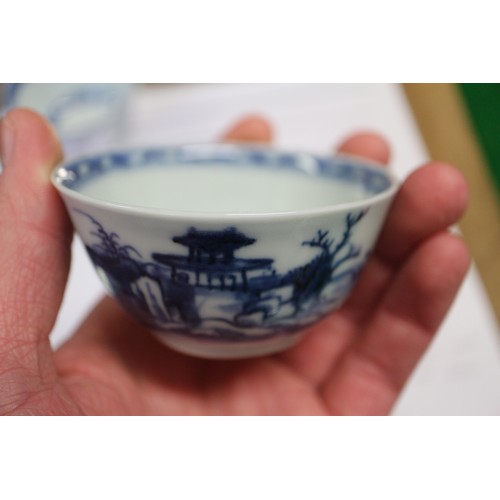 149 - Three Nanking cargo tea bowls and saucers with blue and white landscape decoration, and 