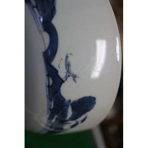 150 - Three Nanking cargo bowls with blue and white landscape decoration, 6 1/2