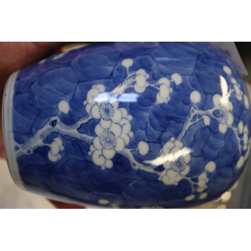 156 - A Chinese blue and white mug with building in landscape decoration (restored and cracked), a blue an... 