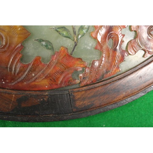 168 - A Chinese circular jade and hardstone inlaid table screen, on carved and pierced stand, 21 1/2