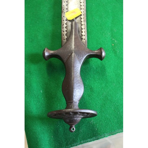 256 - A 19th century Indian Tulwar type sword, blade 27 3/4