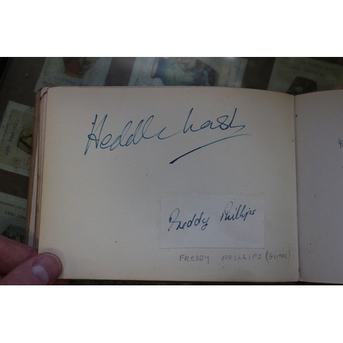 336 - An album containing autographs of stars of stage and screen, including Jon Pertwee, Peter Cavenagh, ... 