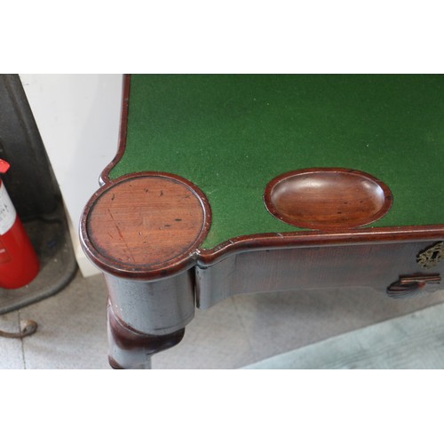 546 - An early George III mahogany fold-over top card table with counter wells and single gate, on shaped ... 