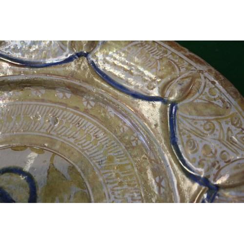 8 - A late 16th century Hispano-Moresque lustre decorated charger, 16