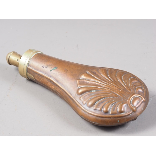 200 - A 19th century copper and brass powder flask