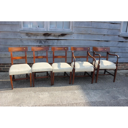 501 - A set of five early 19th century mahogany and satinwood oval lozenge inlaid bar back dining chairs w... 