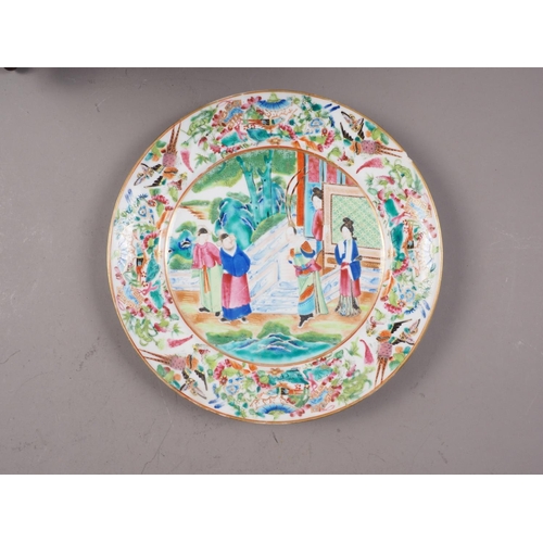 87 - A Canton famille verte enamel bowl with figure decorated panels, 9