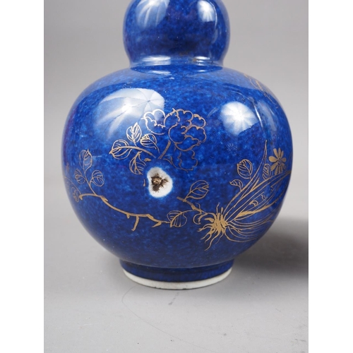 101 - A Chinese baluster vase, decorated panels with a bird in a tree and a figure in a landscape on a dar... 