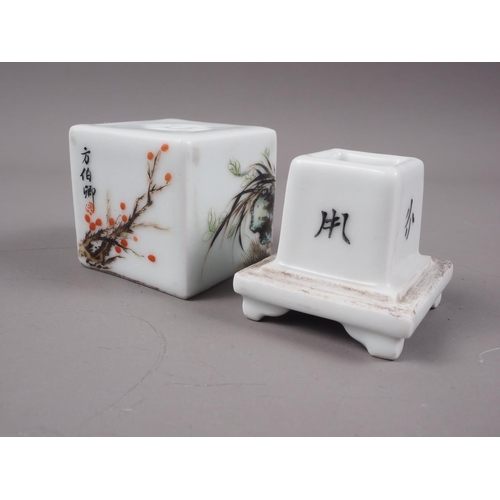 106 - A Chinese porcelain incense cube decorated foliage and characters, 1 3/4