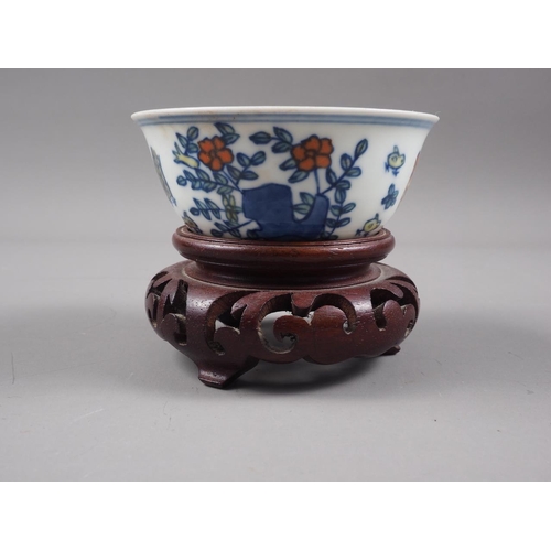 108 - A Chinese porcelain Ducai tea bowl, decorated chickens, six-character mark to base, 3 1/4