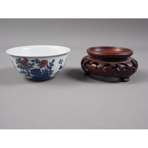 108 - A Chinese porcelain Ducai tea bowl, decorated chickens, six-character mark to base, 3 1/4