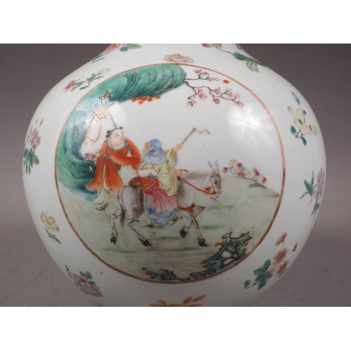 118 - A Chinese porcelain bulbous vase with enamelled panels of figures in landscapes on a floral strewn g... 