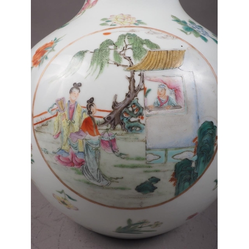 118 - A Chinese porcelain bulbous vase with enamelled panels of figures in landscapes on a floral strewn g... 