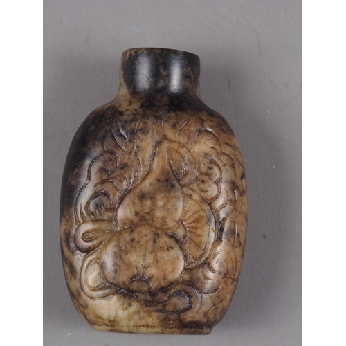 126 - A Chinese carved hardstone snuff bottle, decorated double gourd and precious object, 2 3/8