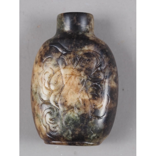 126 - A Chinese carved hardstone snuff bottle, decorated double gourd and precious object, 2 3/8