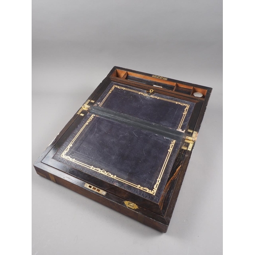 172 - A 19th century figured walnut and brass bound writing box, 16