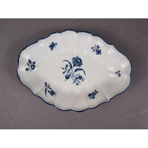 18 - A mid 18th century Worcester blue and white shaped dish with basketwork relief edge and gillyflower ... 