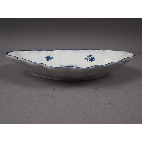 18 - A mid 18th century Worcester blue and white shaped dish with basketwork relief edge and gillyflower ... 