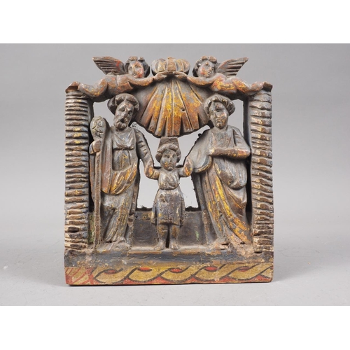 180 - An 18th century South American carved and painted hardwood Christ child with saints, 7