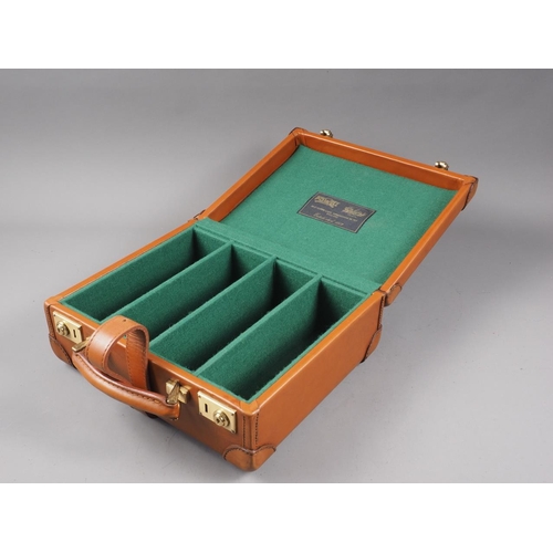 191 - A William Powell tan leather four-division cartridge box, 12 1/4