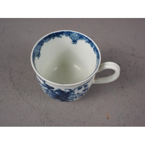 22 - A mid 18th century Worcester blue and white hand-painted cup, 2 1/4