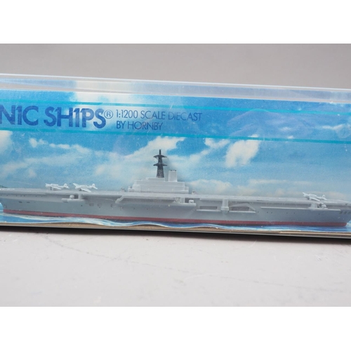 232 - A Minic Ships by Hornby scale die-cast model of the HMS Vanguard and another similar die-cast model ... 